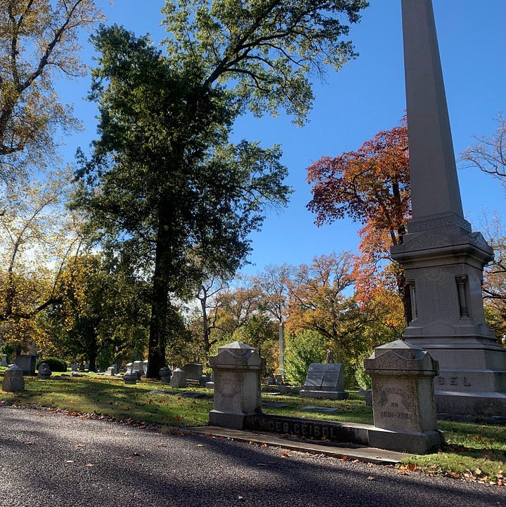 Two photos of Bellefontaine Cemetery in St. Louis; at left, the image shows a vibrantly orange and yellow tree with graves below it; at right, large monumental grave markers reach toward the sky.