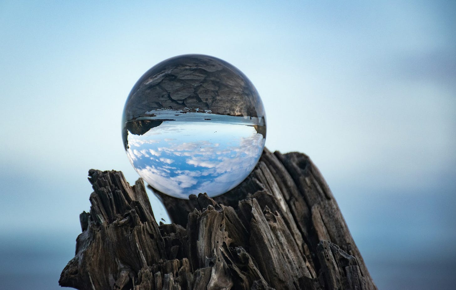 A crystal ball on wood