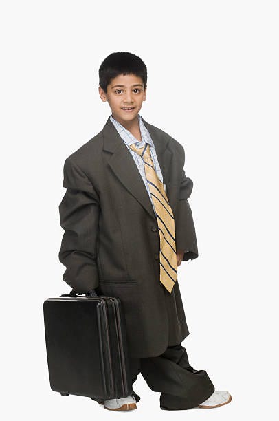 50+ Kid In Oversized Suit Stock Photos, Pictures & Royalty-Free Images ...