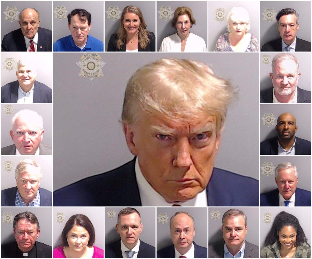 Donald Trump and 18 others indicted in Georgia election case meet the  deadline to surrender at jail | PBS NewsHour