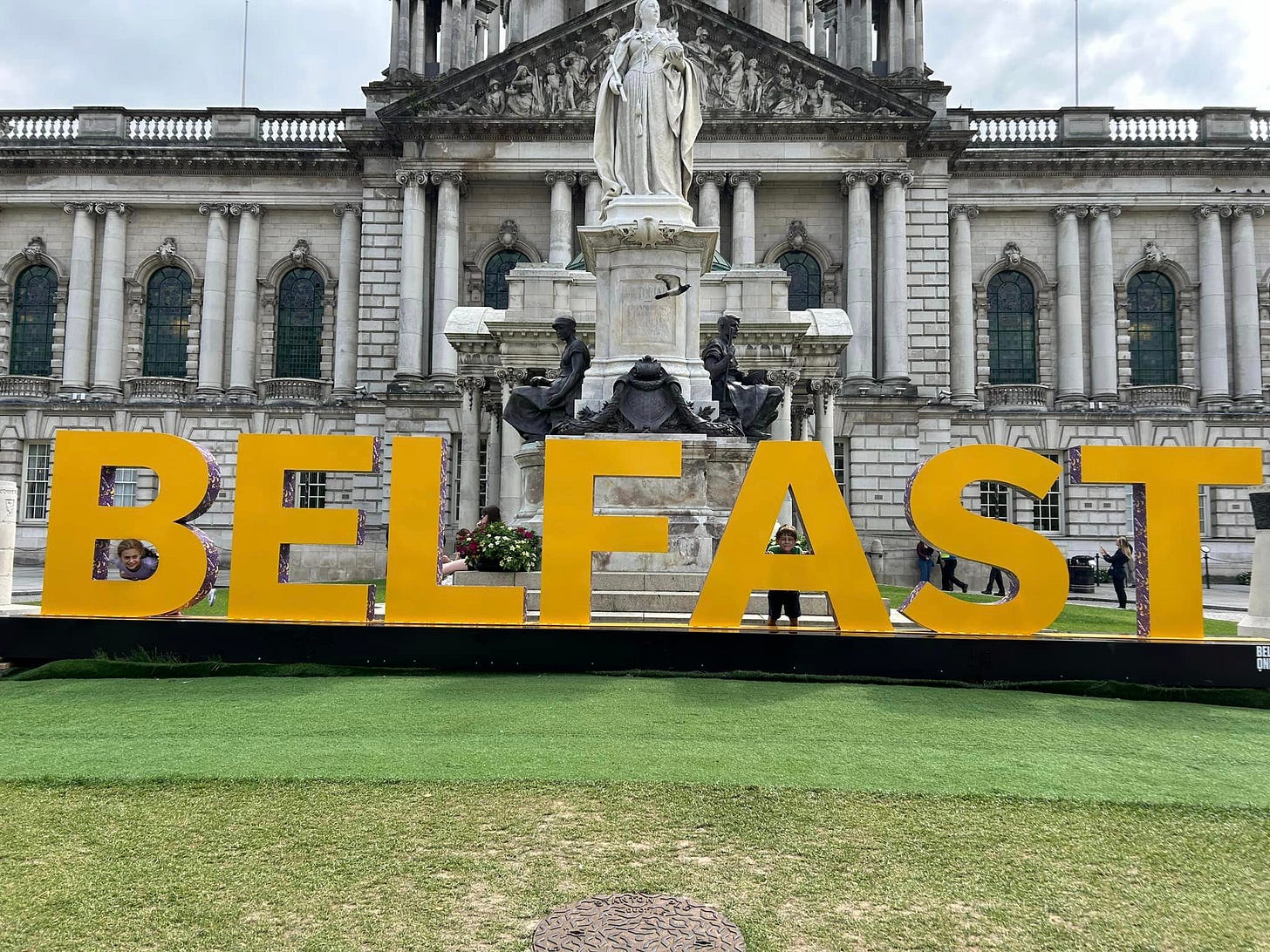 May be an image of the Brandenburg Gate and text