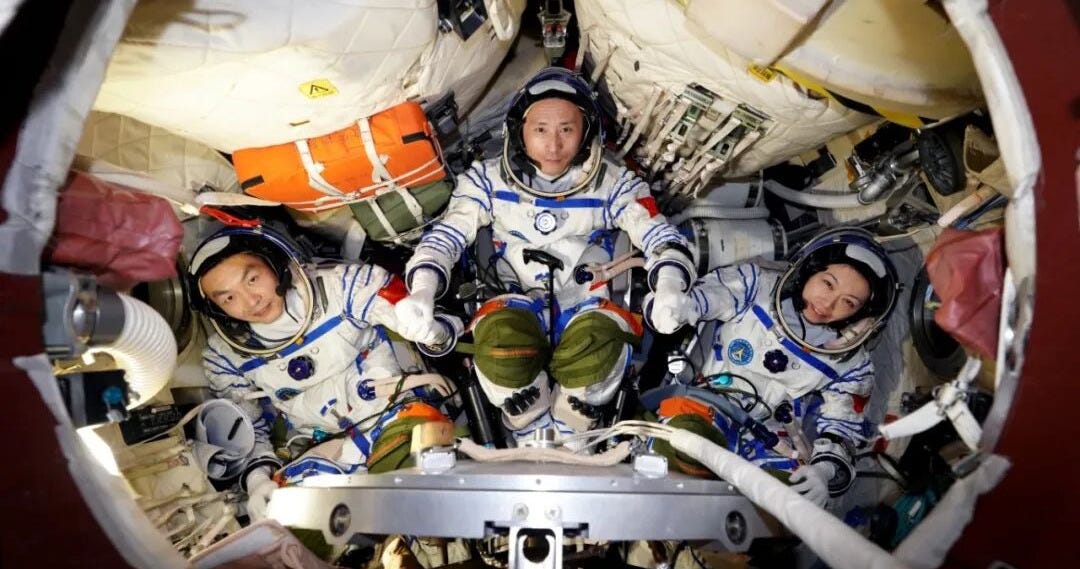 Zhang Zhiyuan (left), Zhu Yangzhu (center), and Li Jiaying (right) training for launch inside of a Shenzhou spacecraft simulator. Zhang Zhiyuan (left), Zhu Yangzhu (center), and Li Jiaying (right) training for launch inside of a Shenzhou spacecraft simulator.