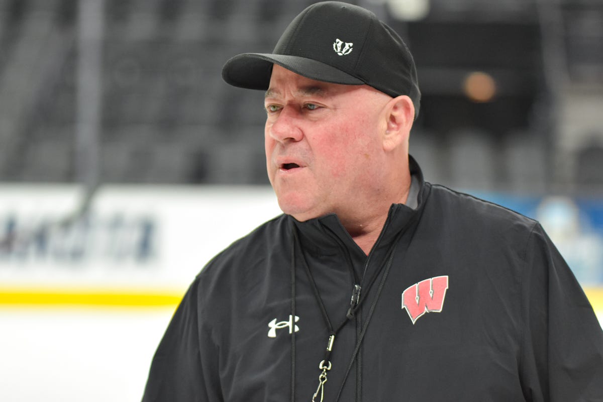 Mike Hastings portrait black hat whistle 