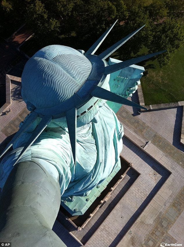 A statue of liberty seen from above

AI-generated content may be incorrect.