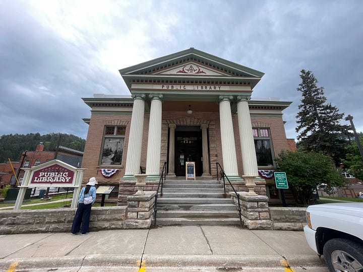 Deadwood's Carnegie Library and neighboring of Lead's Hearst Library.