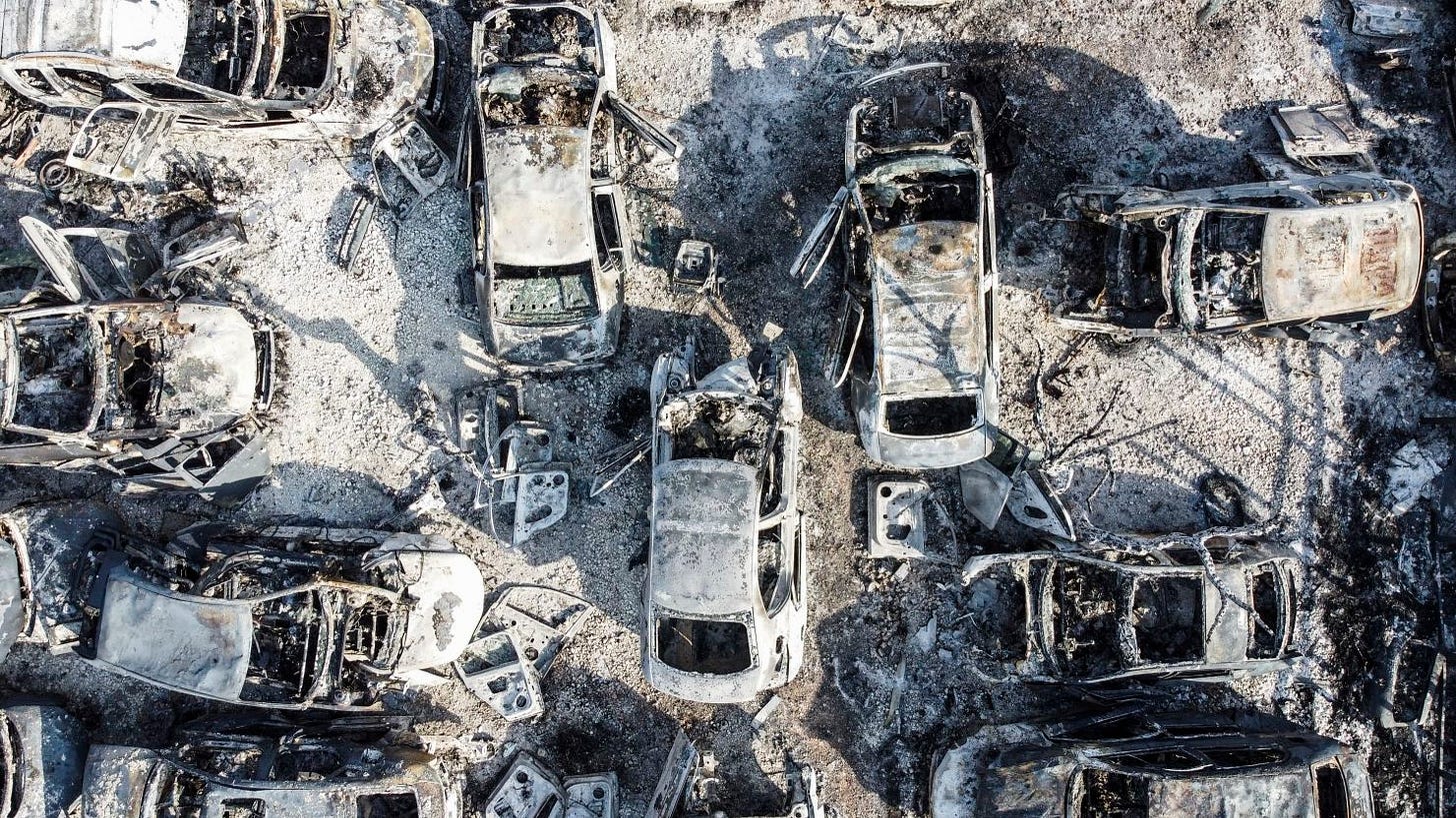 An aerial view shows vehicles torched by Israeli settlers in an attack on Huwara on February 26, triggered by the killing of two Israelis in the occupied West Bank town. An aerial view shows vehicles torched by Israeli settlers in an attack on Huwara on February 26, triggered by the killing of two Israelis in the occupied West Bank town.