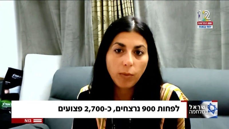 Screenshot of a woman doing a TV interview Screenshot of a woman doing a TV interview
