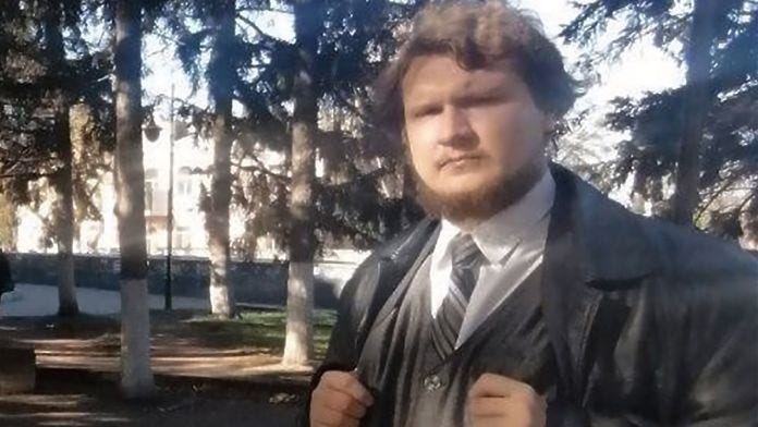 A person in a suit and tie
Description automatically generated A person in a suit and tie
Description automatically generated