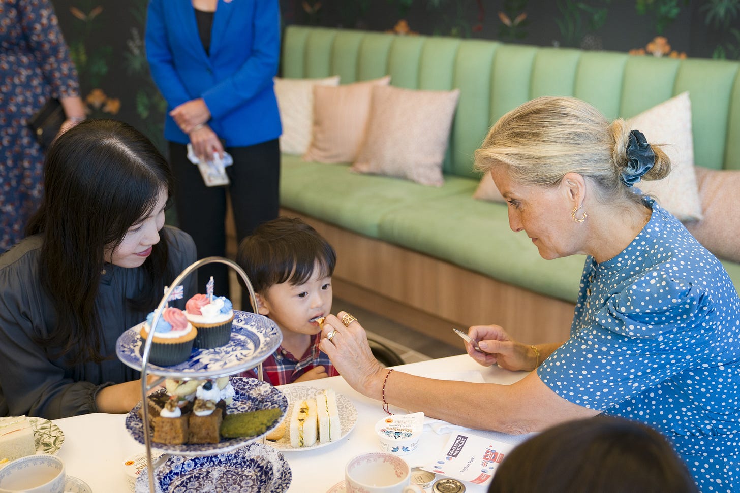 Duchess Sophie feeding a child Duchess Sophie feeding a child