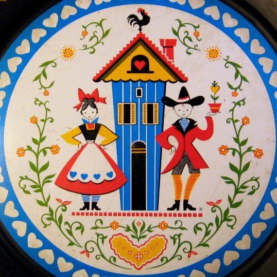 This may contain: a plate with an image of two people standing in front of a blue and yellow house