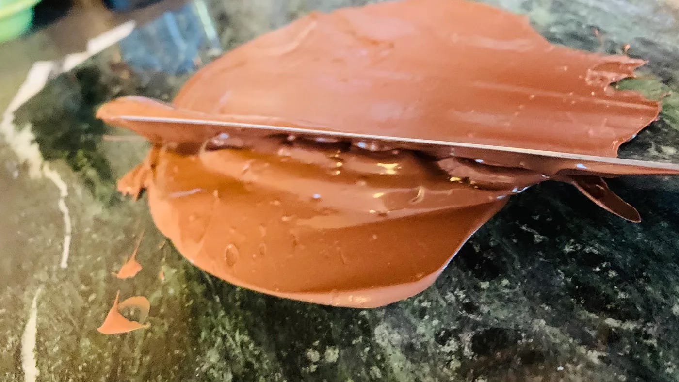 chocolate tempering on a marble countertop