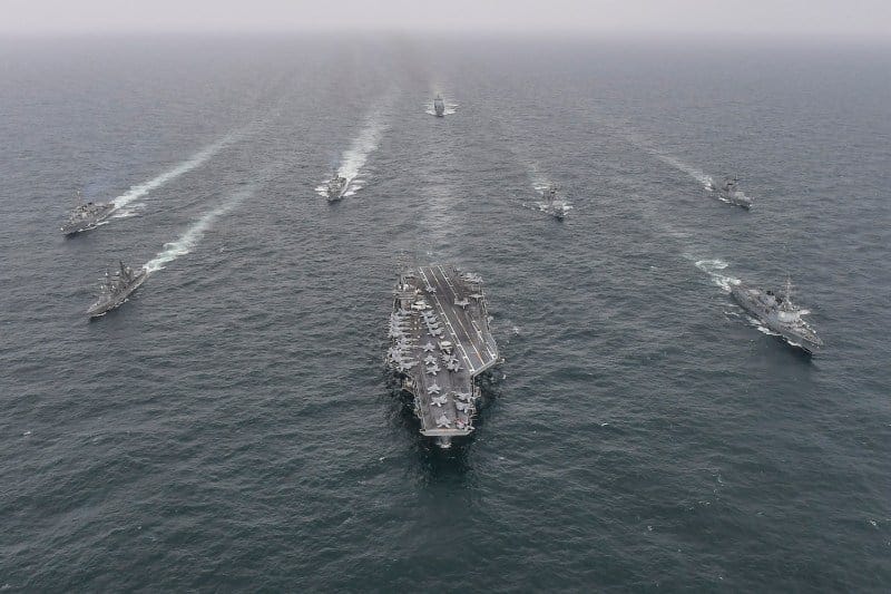 In this handout image released by the South Korean Defense Ministry, South Korean Navy's destroyer Yulgok Yi I (R) U.S. Navy's aircraft carrier USS Nimitz (C) and Japan Maritime Self-Defense Force's Umigiri, (L) sail in formation during a joint naval exercise in international waters off South Korea's southern island of Jeju on Apr. 4, 2023 In this handout image released by the South Korean Defense Ministry, South Korean Navy's destroyer Yulgok Yi I (R) U.S. Navy's aircraft carrier USS Nimitz (C) and Japan Maritime Self-Defense Force's Umigiri, (L) sail in formation during a joint naval exercise in international waters off South Korea's southern island of Jeju on Apr. 4, 2023