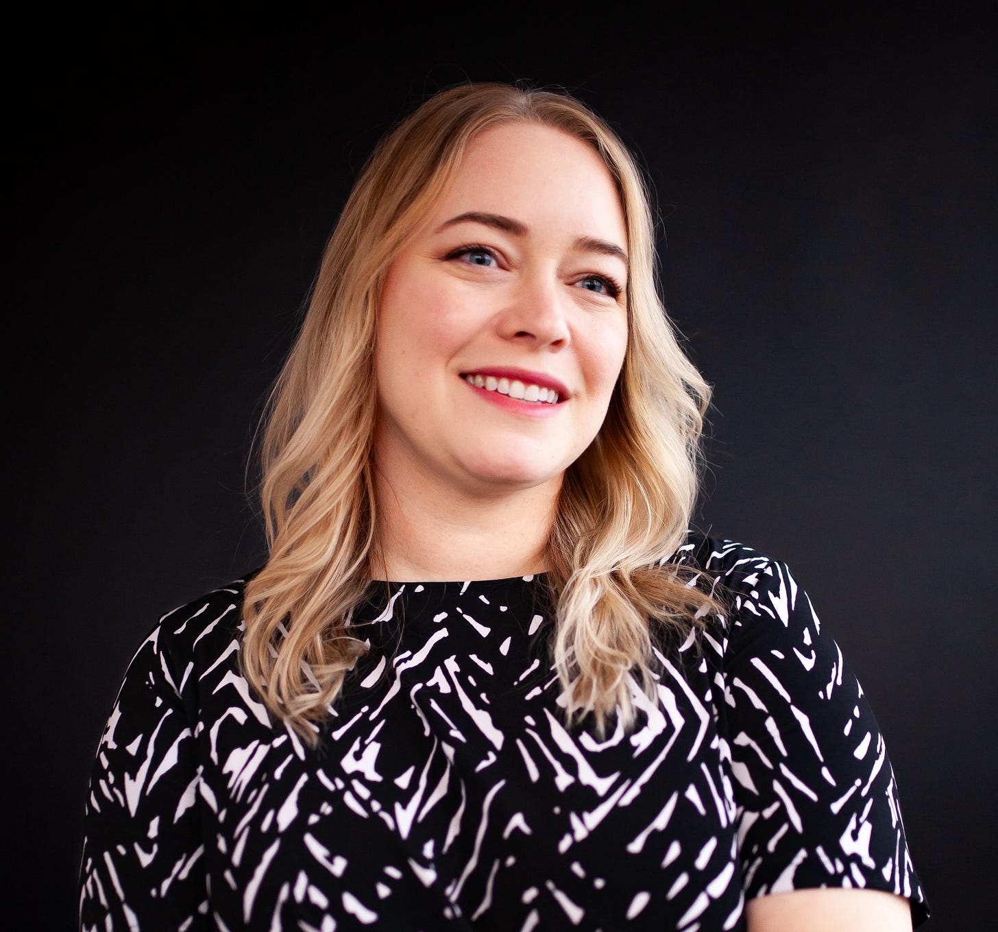 Candice, a blond haired, white woman in her late 30's is smiling. Candice, a blond haired, white woman in her late 30's is smiling.