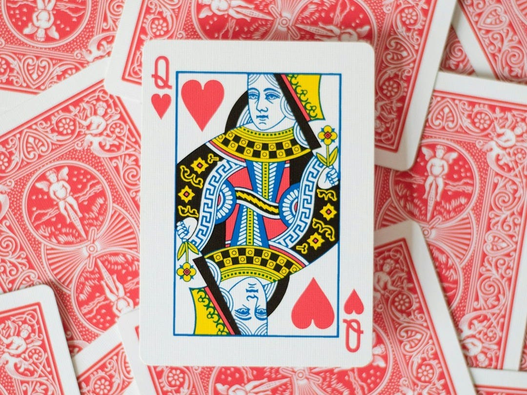 A pile of red and white playing cards A pile of red and white playing cards