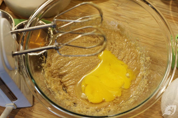 Step 2 - Cream the melted butter and brown sugar together in a large bowl or stand mixer, beating until smooth and creamy. Next, add the egg yolks and vanilla. Step 2 - Cream the melted butter and brown sugar together in a large bowl or stand mixer, beating until smooth and creamy. Next, add the egg yolks and vanilla.