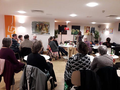 9 images from literary events in Medway. People reading from their books, people watching writers reading from their books. 