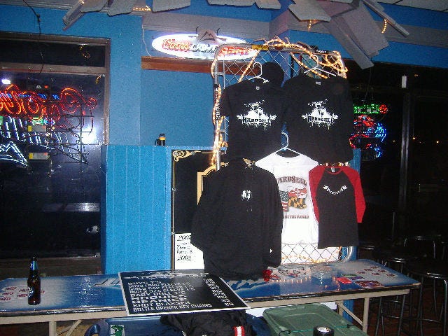 I was a little surprised they didn't have any music to go with the shirts and other items. But the table sort of fits with the band name does it not? I was a little surprised they didn't have any music to go with the shirts and other items. But the table sort of fits with the band name does it not?