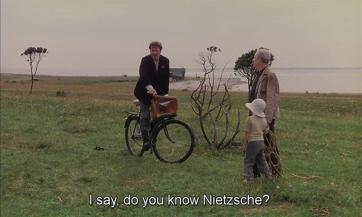 This may contain: two men standing next to each other on a field with a bike in front of them