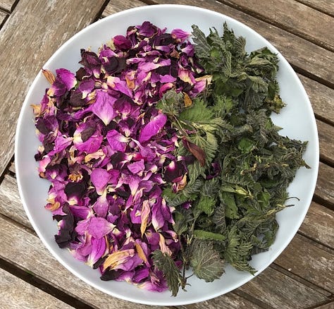 Dried green bay leaves, orange marigold petals, pink rose petals, green nettle leaves
