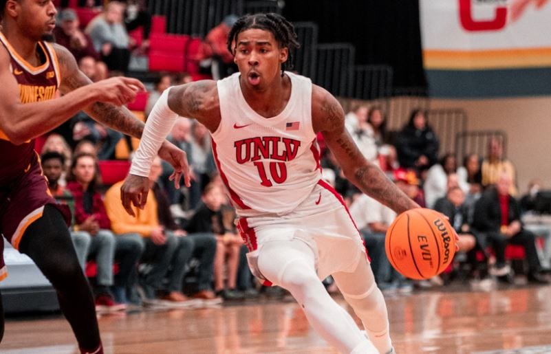 Rebels remain perfect at 6-0 with 71-62 win over Minnesota Rebels remain perfect at 6-0 with 71-62 win over Minnesota