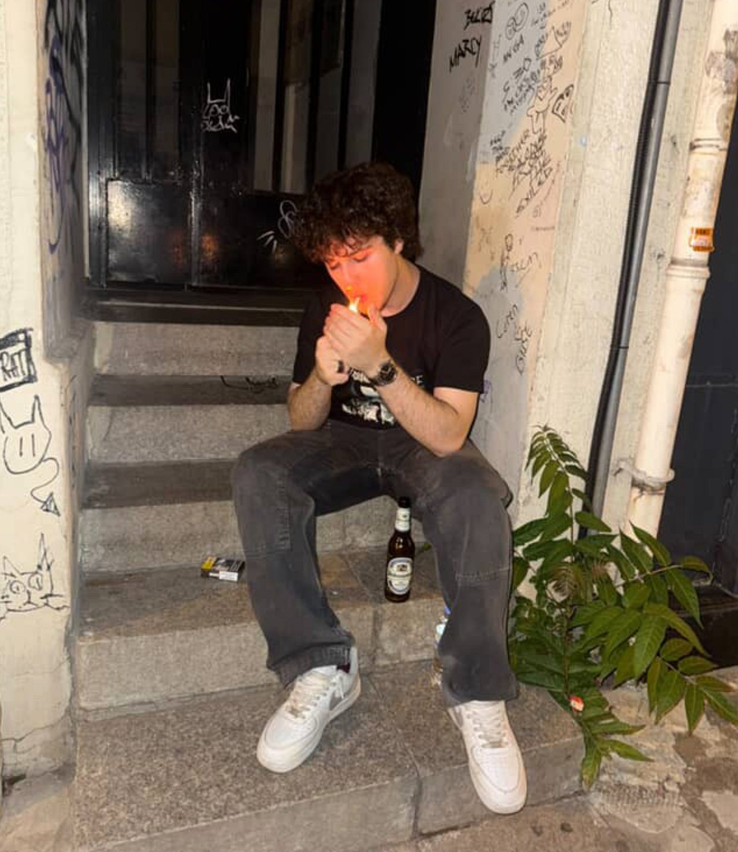 Ibo Eshak smoking a cigarette