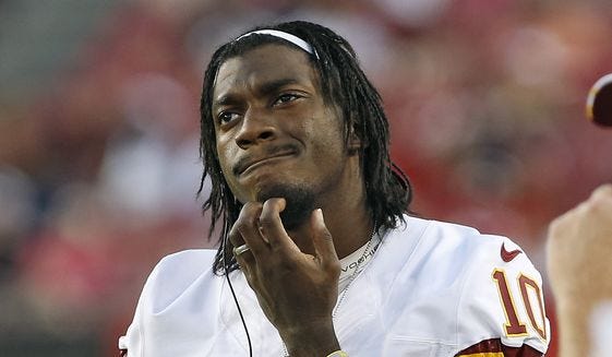 rg3 robert griffin iii criticizes washington redskins nfl 2014 rg3 robert griffin iii criticizes washington redskins nfl 2014