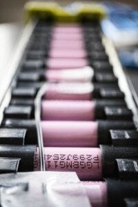 a row of pink batteries