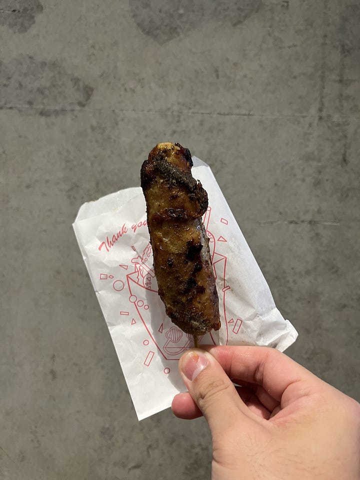 on the left, image of chicken leg sausage, on the right, image of fried chicken cutlet against ximending backdrop