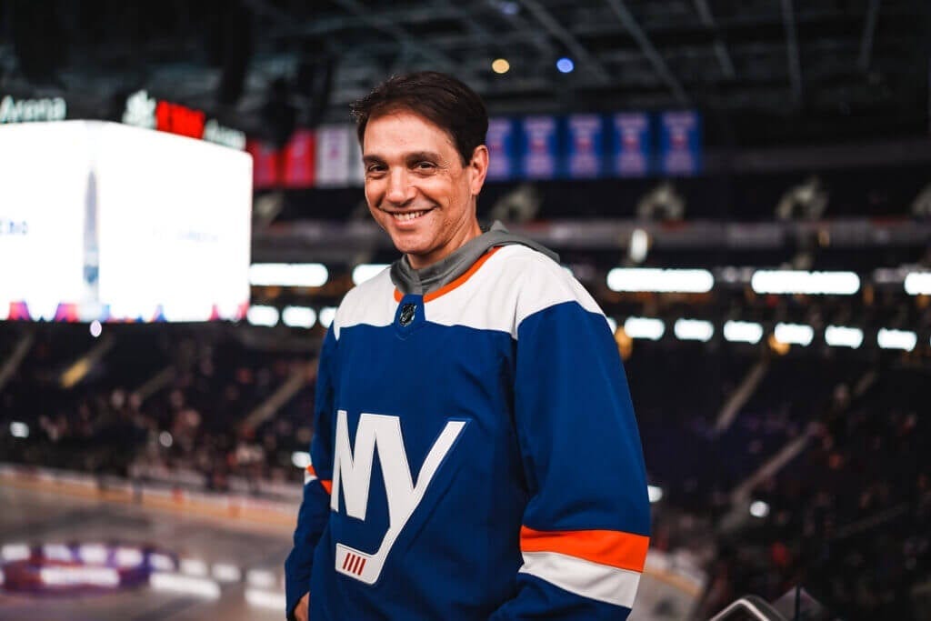 ELMONT, NY - Ralph Macchio poses for a photo during the January 15th game vs. the Washington Capitals at UBS Arena in Elmont. The Capitals defeated the Islanders 2-0.