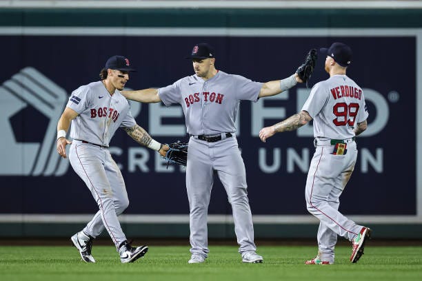 Jarren Duran, Adam Duvall, and Alex Verdugo of the Boston Red Sox celebrate after the game against the Washington Nationals at Nationals Park on...