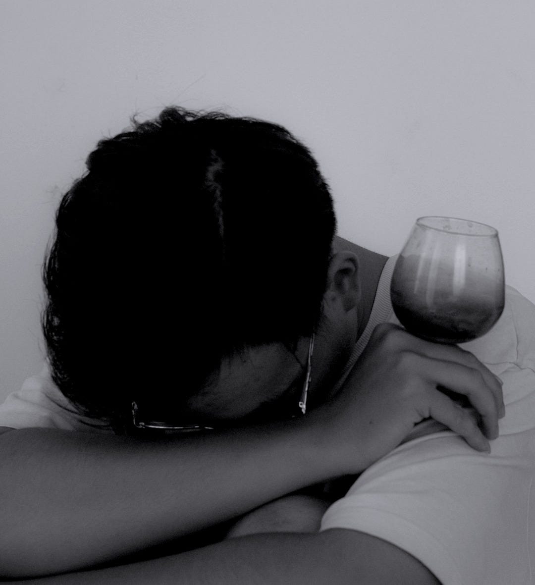 a woman with a glass of wine