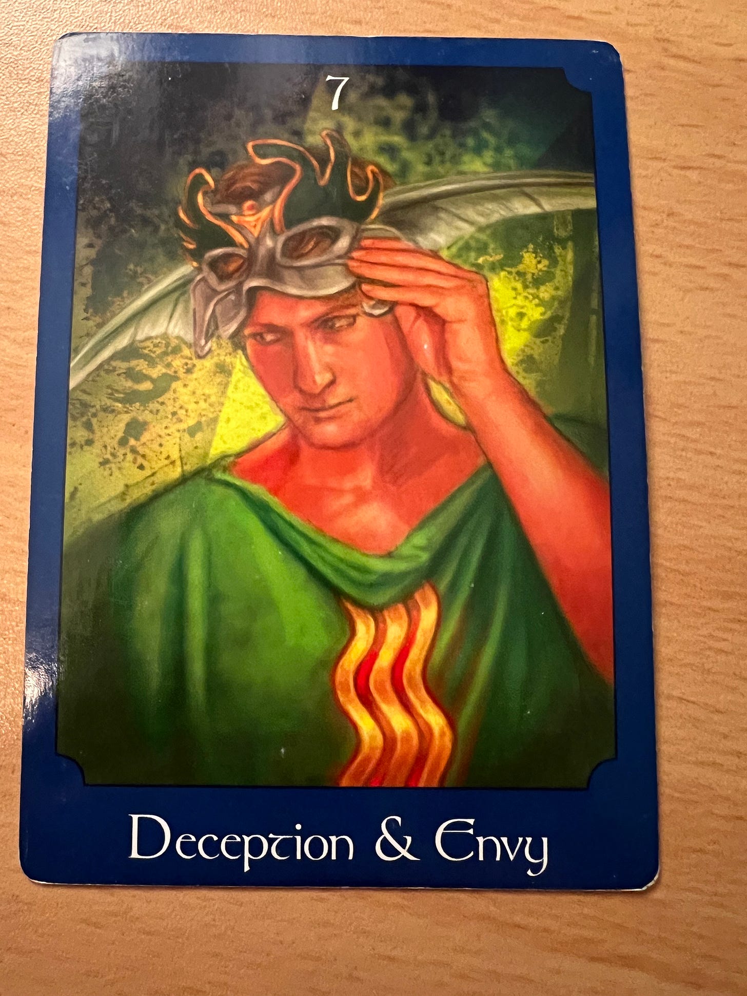 The Deception and Envy Tarot Card