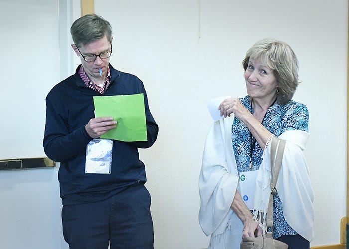 May be an image of 2 people and people studying May be an image of 2 people and people studying