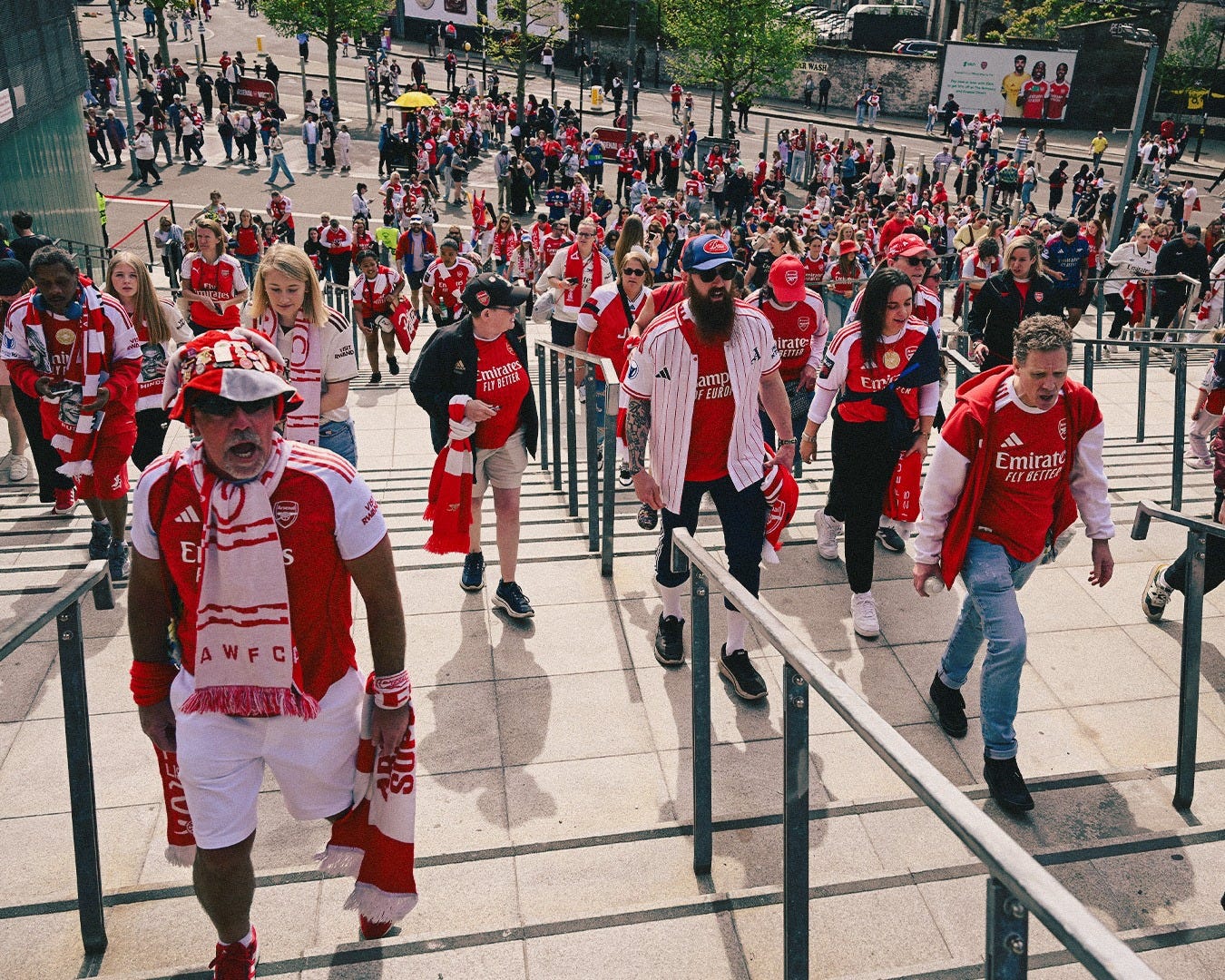 May be an image of one or more people, crowd and text