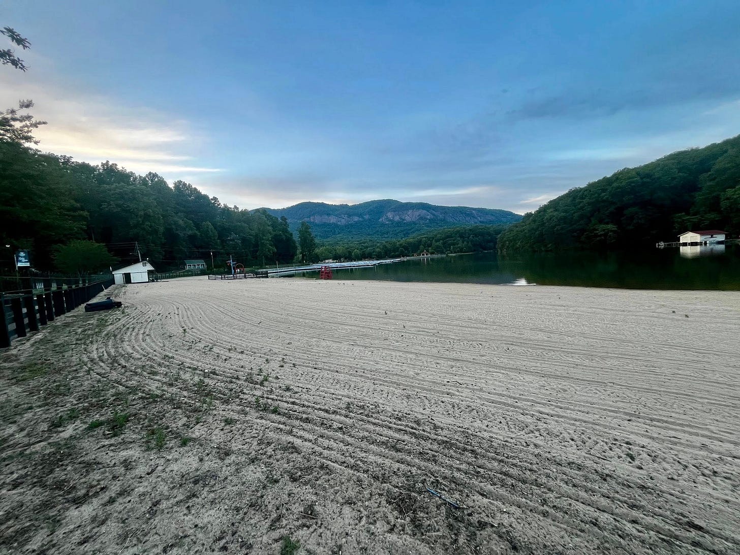 May be an image of campsite, lake and twilight