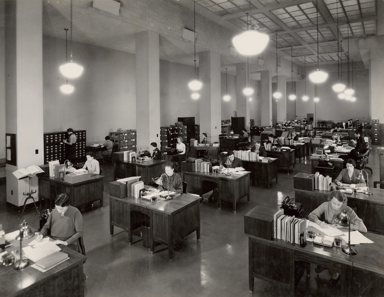 Women working at desks at Division of Classification and Cataloging in 1937