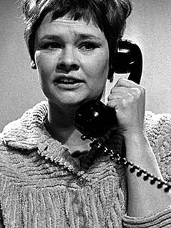 Judi Dench on phone