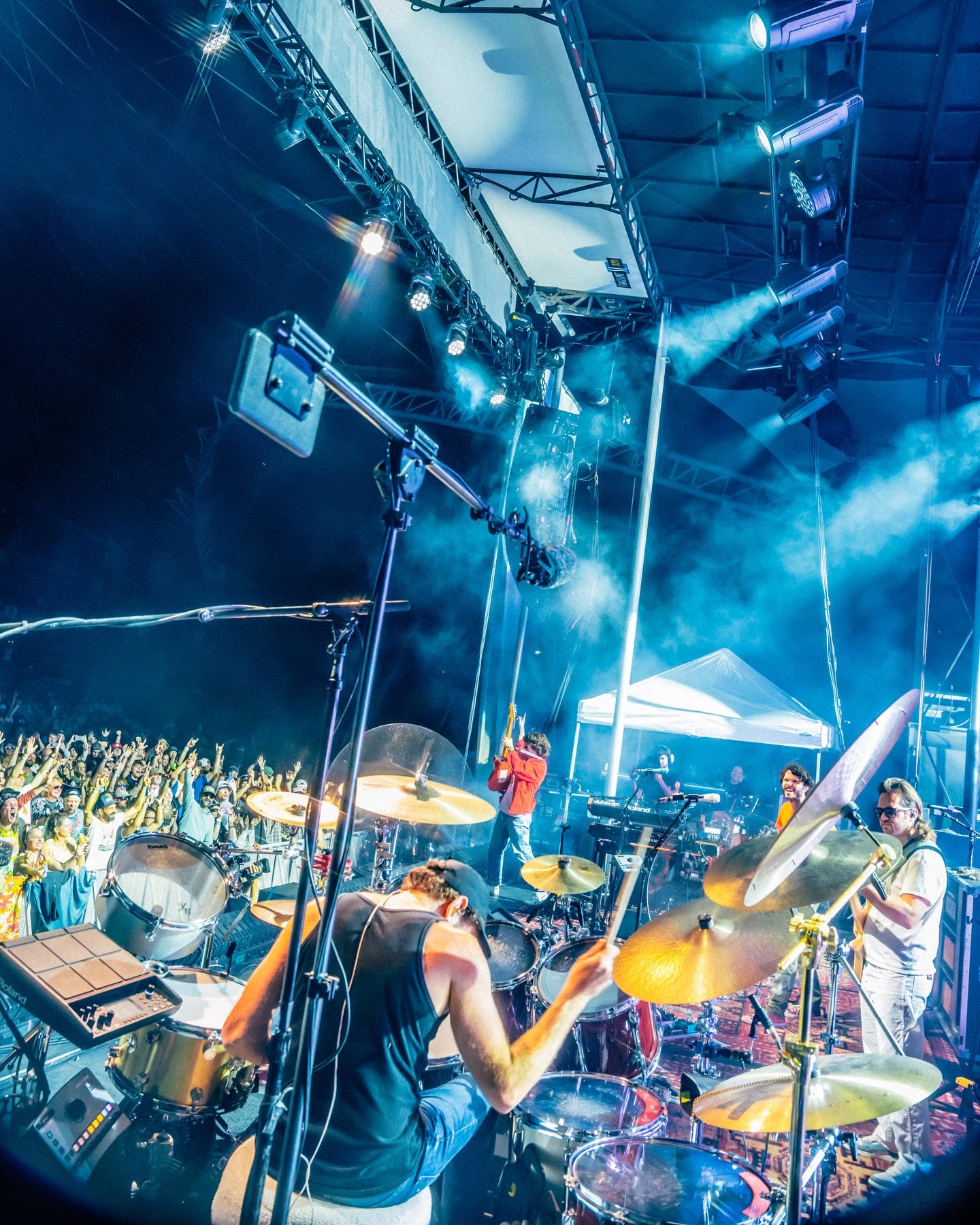 May be an image of 3 people, cymbal and crowd