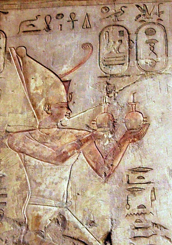 Relief of Psamtik I making an offering to Ra-Horakhty (Tomb of Pabasa) Relief of Psamtik I making an offering to Ra-Horakhty (Tomb of Pabasa)