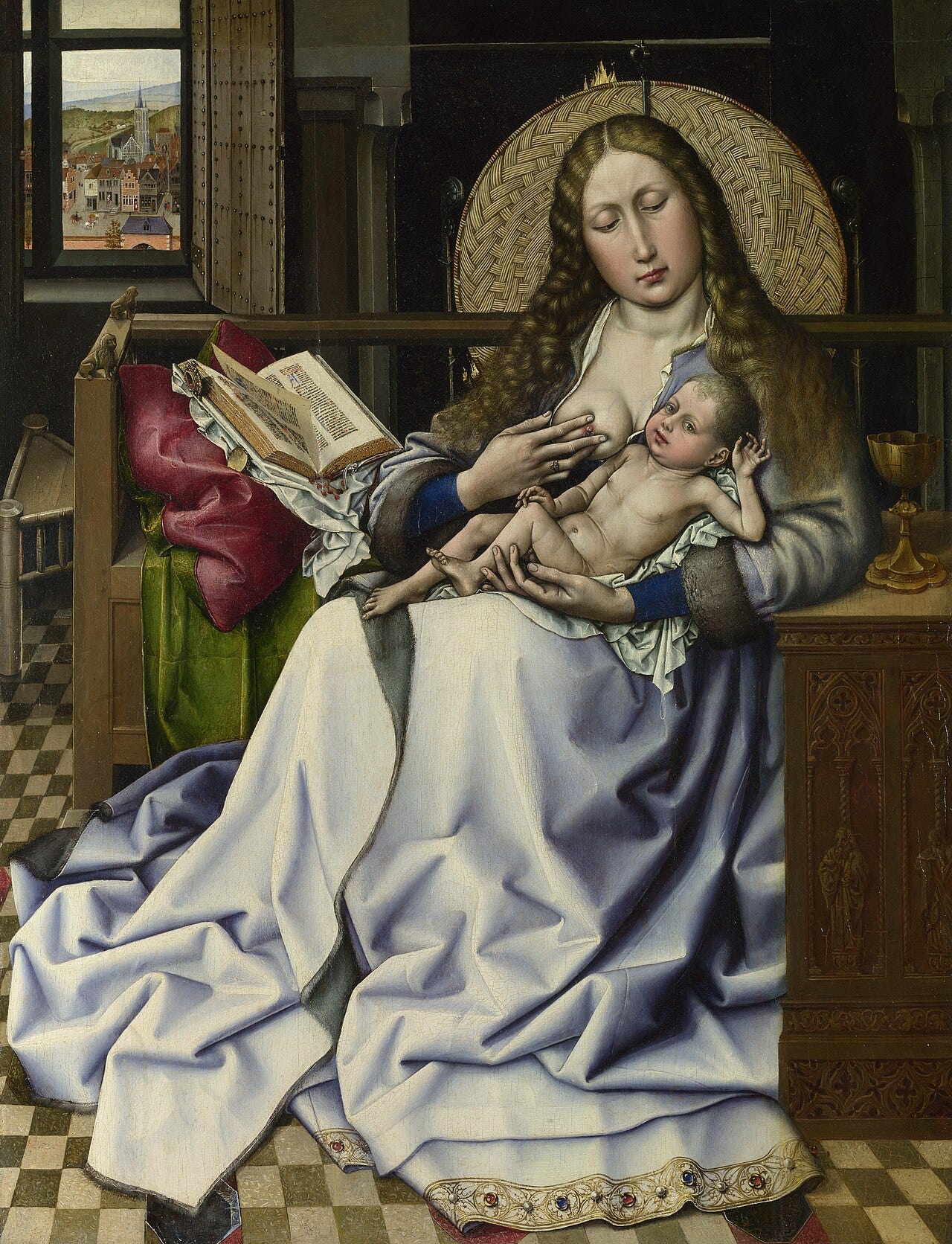 The Virgin and Child before a Firescreen, a Virgin in a blue overdress nursing the naked Child beside a wicker firescreen The Virgin and Child before a Firescreen, a Virgin in a blue overdress nursing the naked Child beside a wicker firescreen