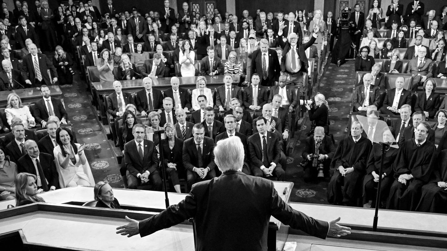 In a black-and-white photo, DOnald Trump speaks to Congress.