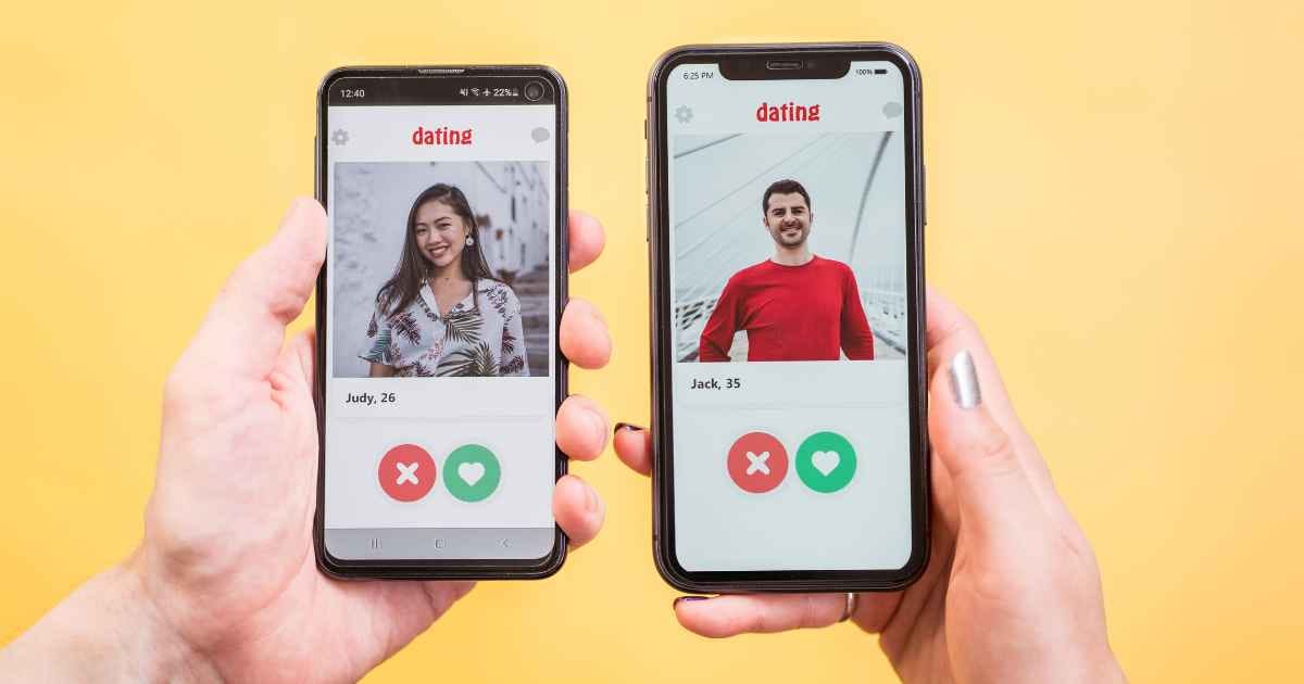 Man and woman pressing like button in dating app