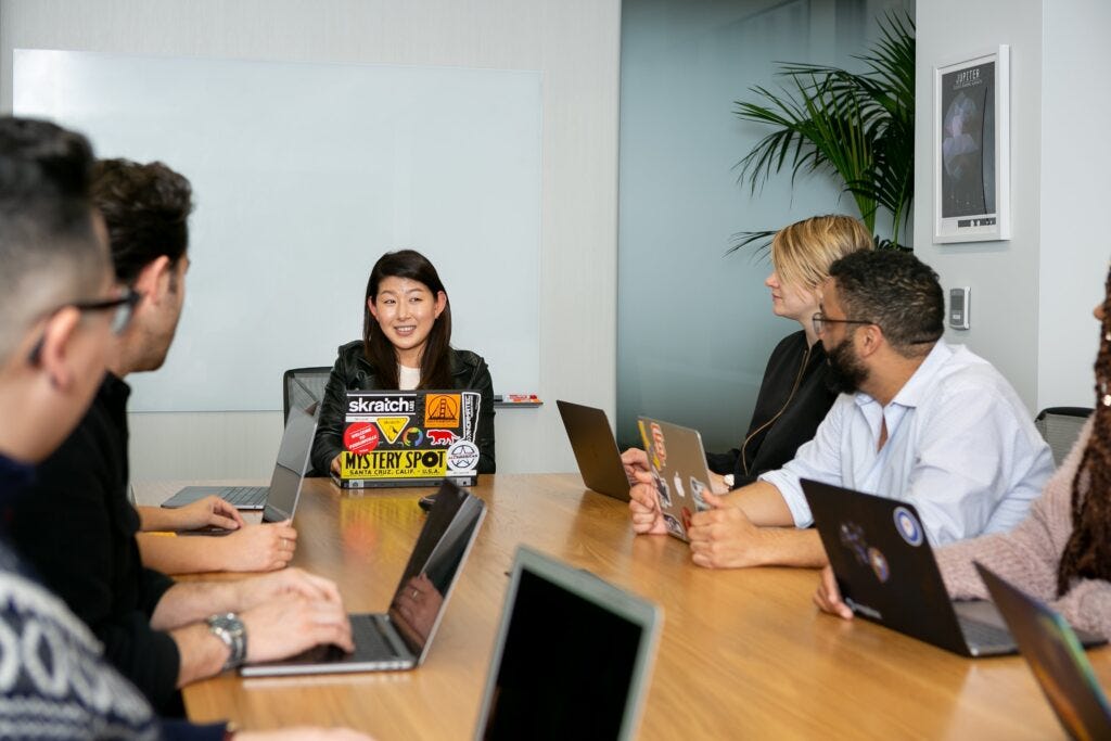 An engineering manager leading a team meeting