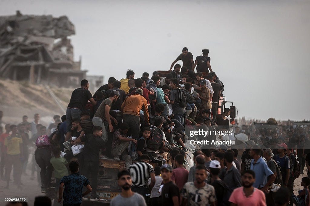 Palestinians flock to aid trucks amid food crisis in Gaza