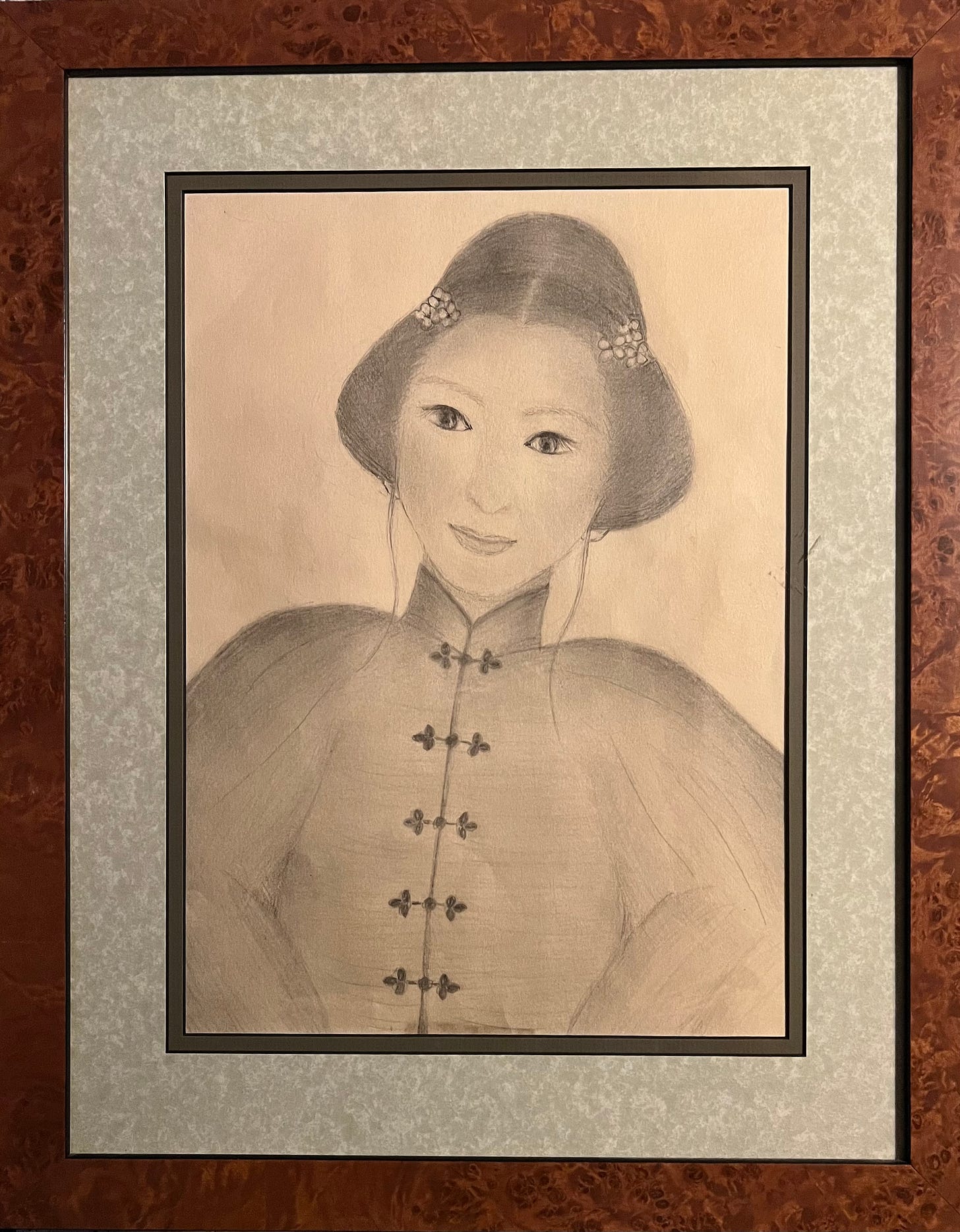 Framed sketch my mother made of her Chinese mother. 