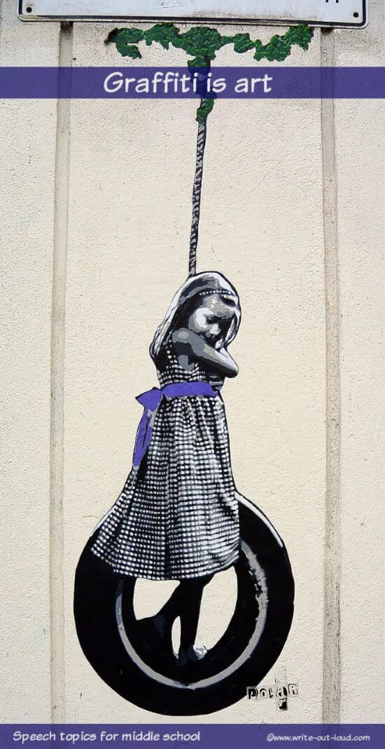 Graffiti: a painting of a girl on a tire swing.