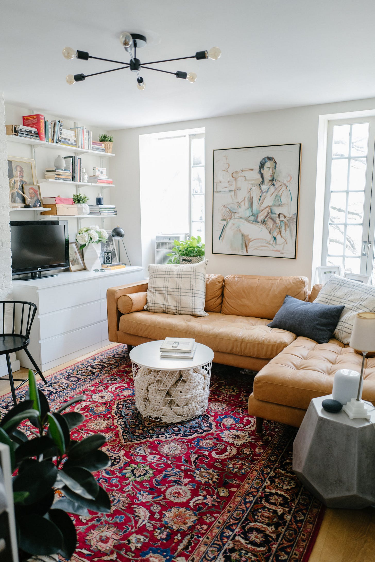 Rug: eBay. Shelves: Ikea. White vase: CB2.&nbsp;