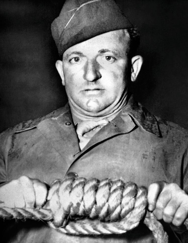 The hangman: U.S. Army John C. Woods. Some say he deliberately bungled the hangings to increase the suffering of the condemned men.