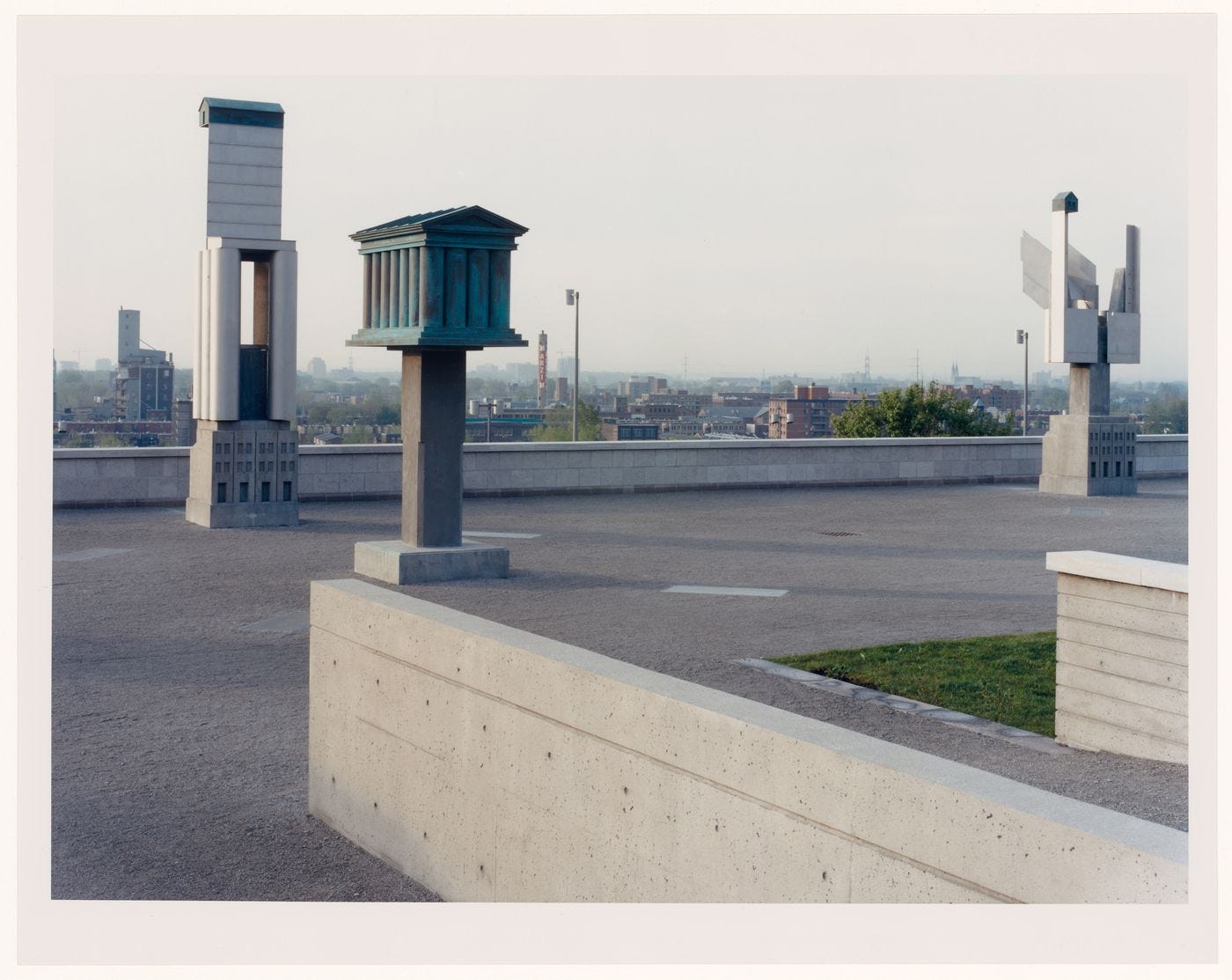 CCA Garden: View of the esplanade showing the allegorical columns, Montréal, Québec, Canada (1990) by Robert Burley.