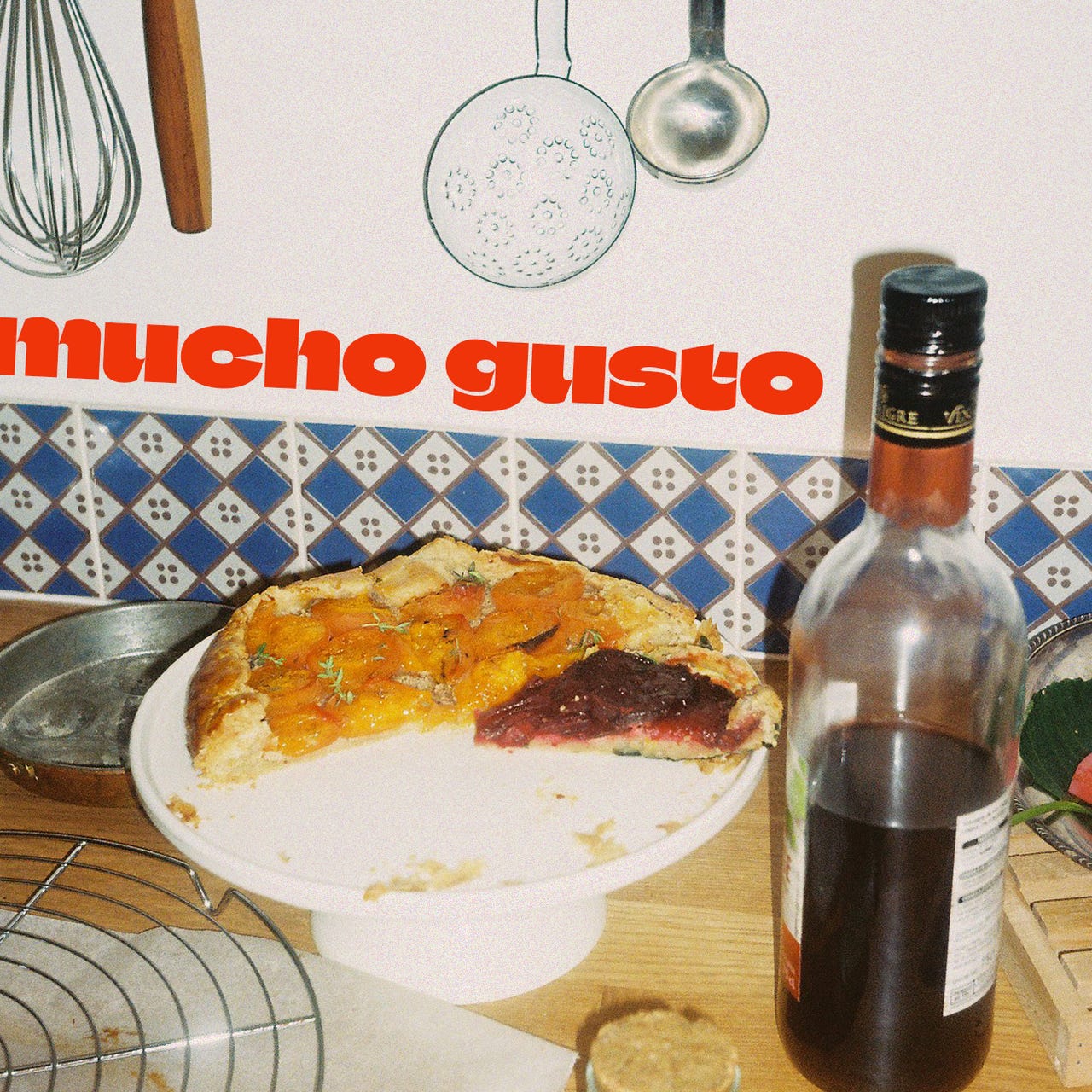 Mucho Gusto logo